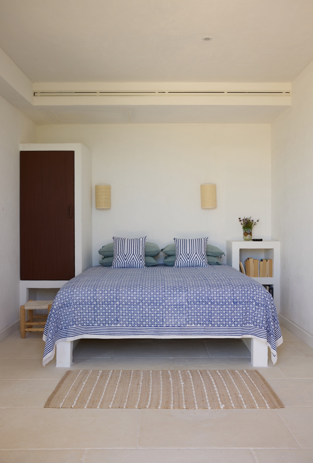Bedroom with blue bedspread